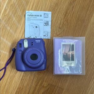 Fujifilm Insta Mini 8 purple with Urban Outfitters photo album